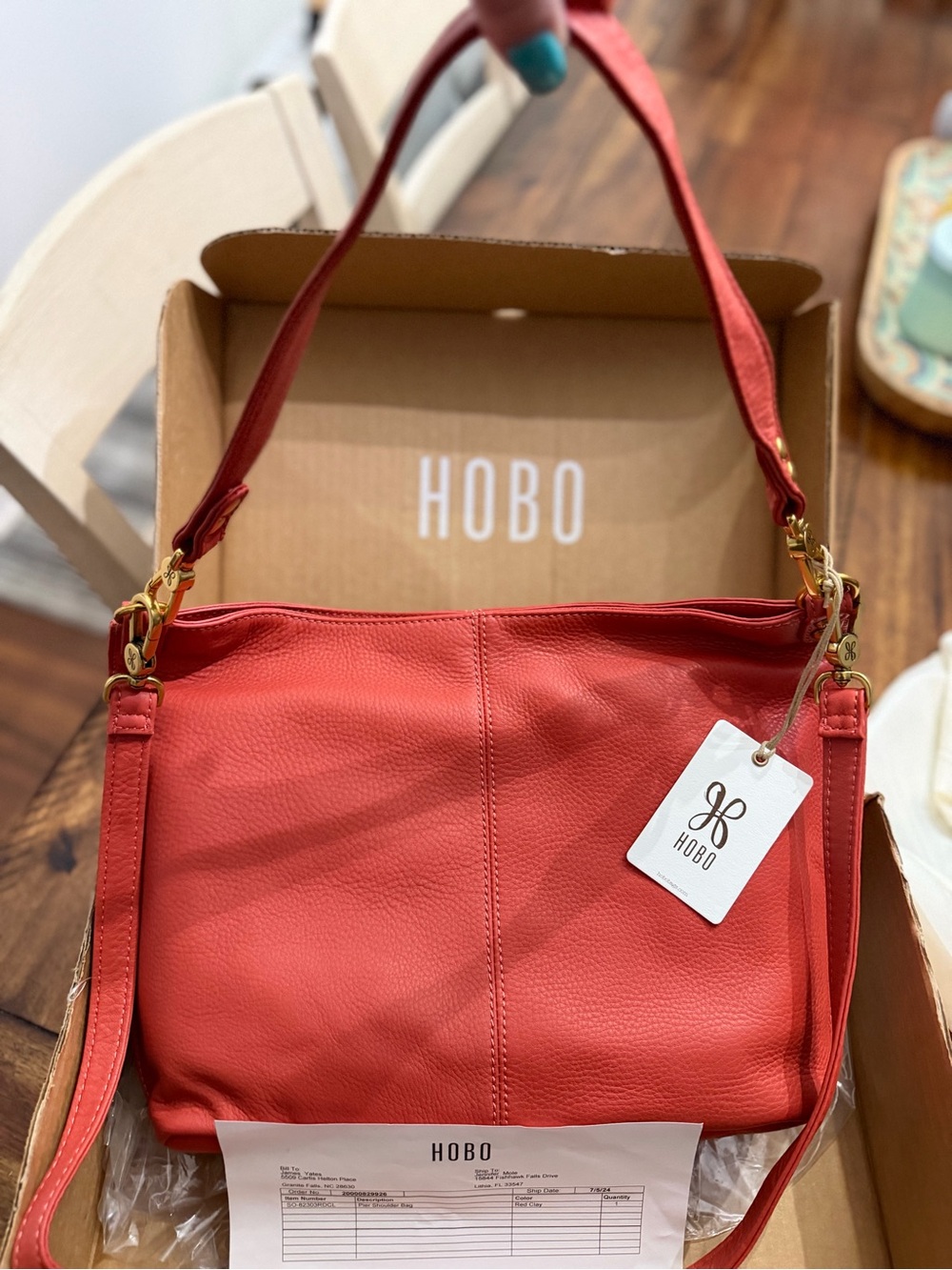 HOBO Vibrant Coral-Red Pebbled Leather Hobo with Gold Hardware